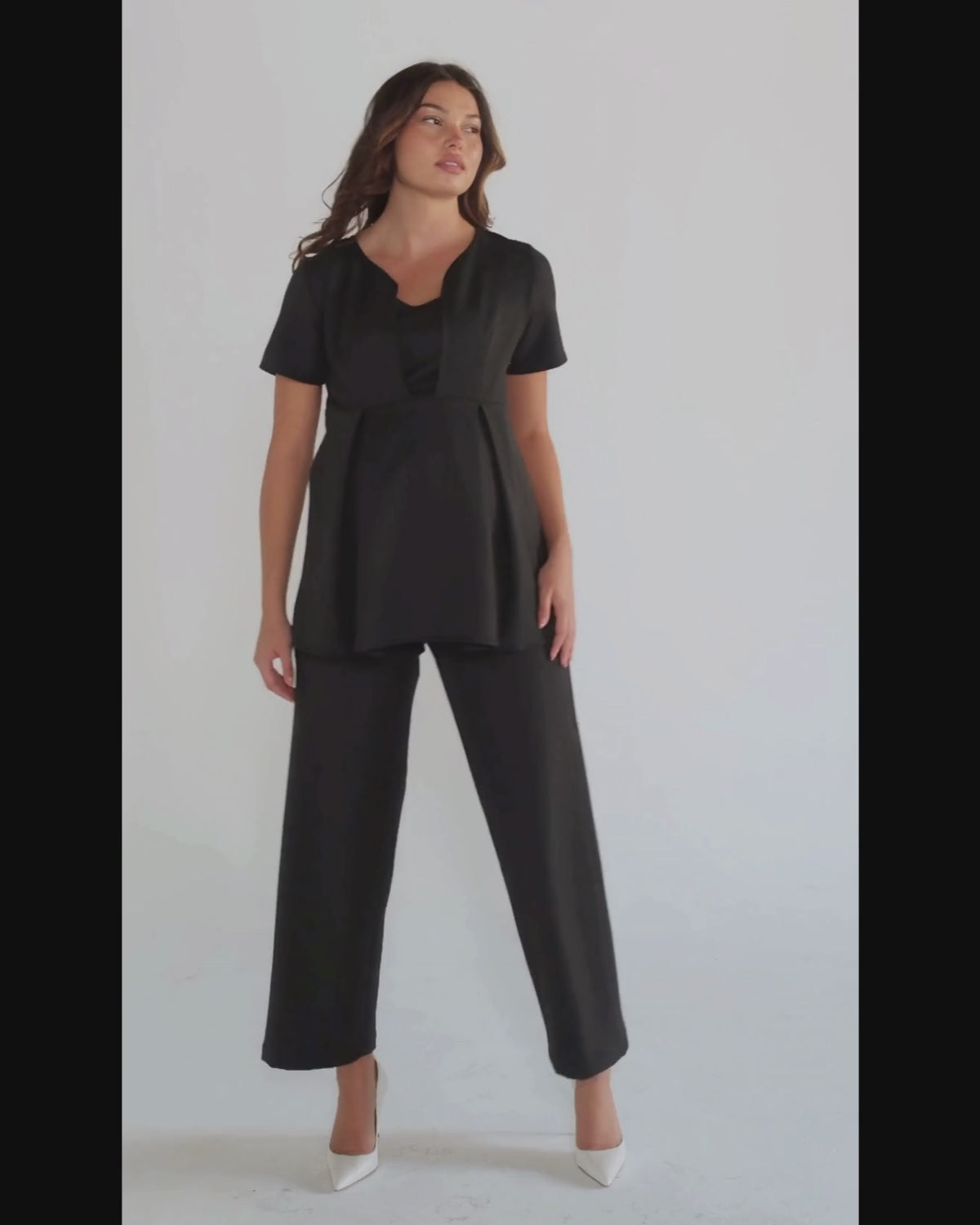 Black luxury maternity suit top separates, part of corporate business maternity skirt suit or pant suit. Nursing access for breastfeeding and pumping ease. Cut with sustainable luxury Italian stretching suiting fabric, washable, travel friendly. For pregnant lawyers, executives, and boss ladies. 