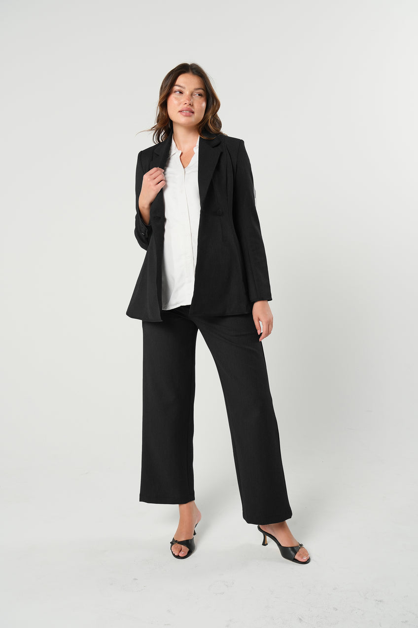 Charcoal gray maternity blazer suit jacket in luxury Italian stretch suiting fabric. Empire waist pant suit separates for your best pregnancy, breastfeeding, and postpartum fit. Petite and regular sizes. 38% sustainable recycled fibers. Also sold by Nordstrom, Bloomingdale's, and Macy's maternity. 
