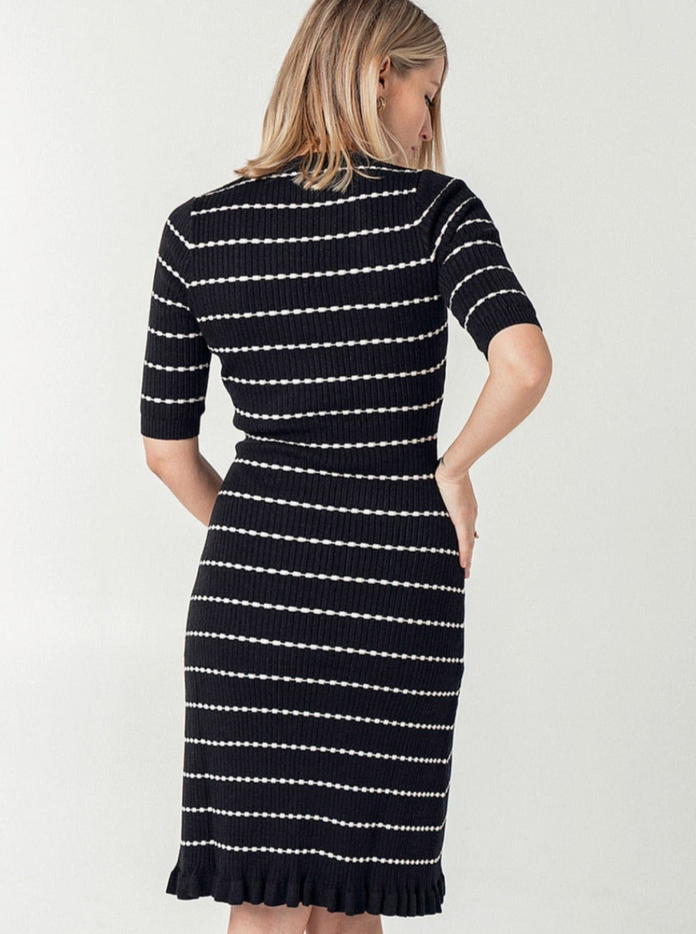 Striped knit maternity dress. This flattering pregnancy dress by MARION features 3/4 sleeves, luxury cotton knit fabric, classic round neck, and feminine hemline. Maternity workwear, maternity wedding guest dress, or baby shower dress. Petite friendly.