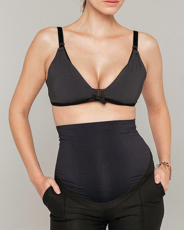 Black wireless maternity and nursing bra with lace details. Made from recycled Polyester and Spandex. 