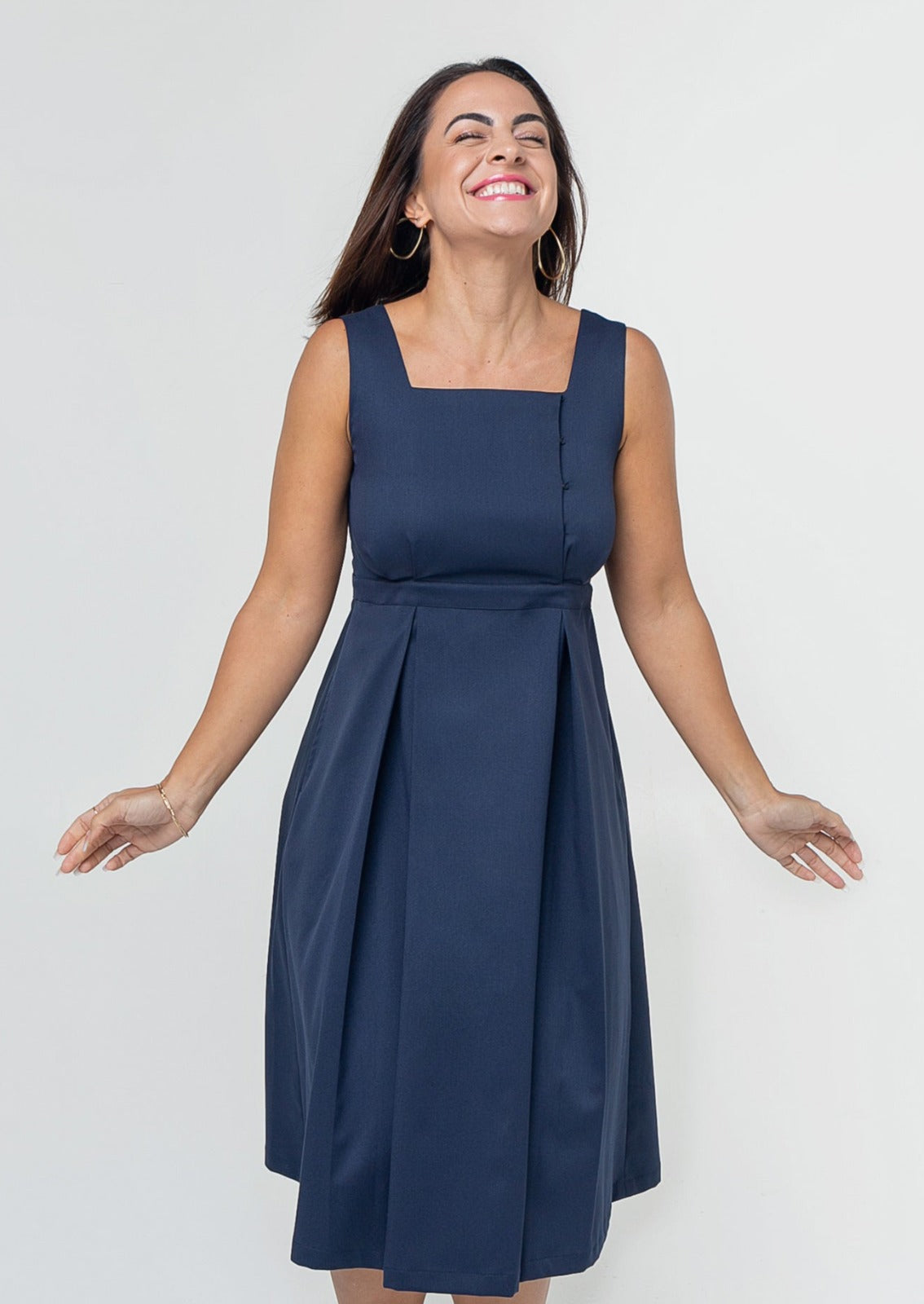 Luxury blue maternity dress, from MARION's collection of luxe maternity and nursing dresses. Sustainable, washable Italian fabric, available in standard and petite maternity sizes. Features designer breastfeeding access. Perfect maternity wedding guest dress, baby shower dress, or maternity tea party dress.